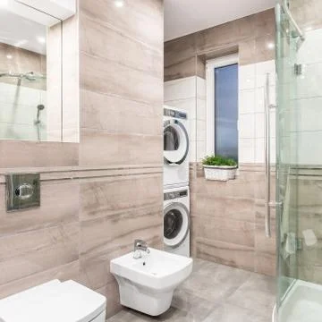 Bathroom with laundry area Stock Photos