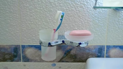 In the bathroom, a man washes his hands with soap Stock Footage 297824102
