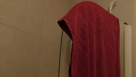 Bathroom. Red towel in the bathroom. Stock Footage 147880604