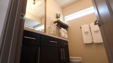 Bathroom Rise and Tilt Down From Doorway Stock Footage 112890063