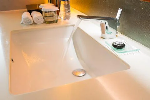 Bathroom set on ceramic wall with lighting of luxury room Stock Photos