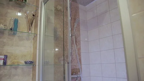 Bathroom with shower. Large square shower head. Stock Footage 131187721