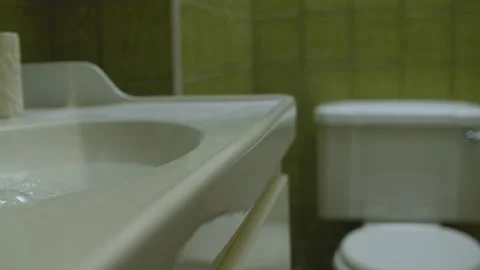 Bathroom sink clogging Stock Footage 131325526