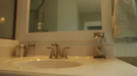 Bathroom sink coming into focus, static Video stock 25912708