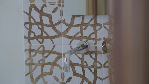 Bathroom sink with decorated tiles Stock Footage 88170790