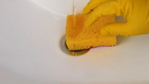 Bathroom sink drain hole cleaning 4K video Stock Footage 117986353