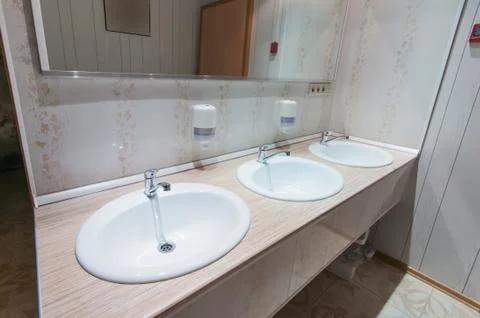 Bathroom with sinks in hostel Stock Photos