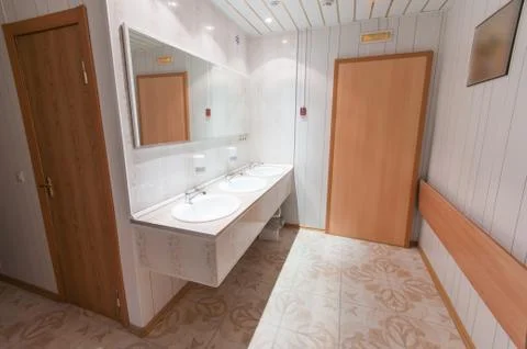 Bathroom with sinks in hostel Stock Photos