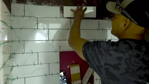 Bathroom  Tile Installation Stock Footage 282854668