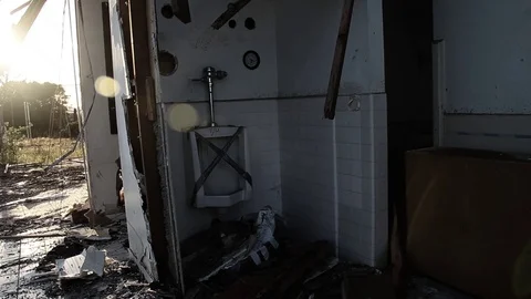 Bathroom in torn down building Stock Footage 94694937