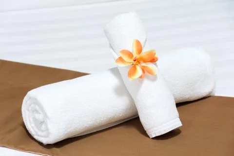 Bathroom towels on bed Stock Photos