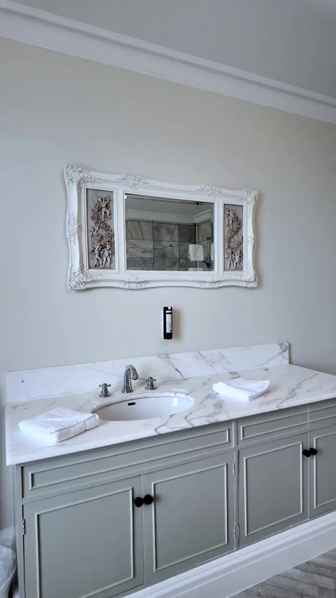 Bathroom Vanity With Marble Countertop Gray Cabinets White Sink Faucet Towels Stock Footage 328345086
