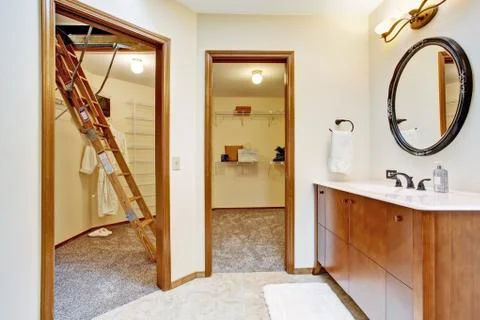 Bathroom with walk-in closets Stock Photos