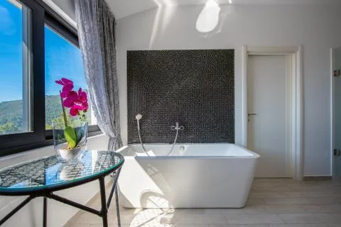 Bathroom window with mountain view Stock Photos