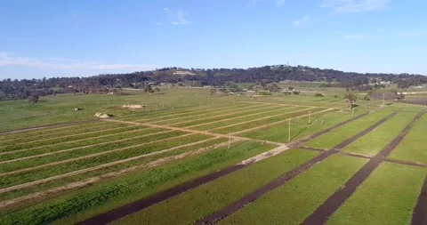 Bathurst Mt Panorama farms and green fields around car racing circle track 4k. Stock Footage 140969664