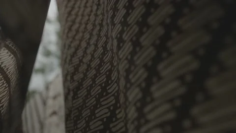 Batik in Java Traditional Fabric of Indonesia - Hanged Cloths Blown by The Wind Video stock 178496809
