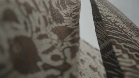 Batik in Java Traditional Fabric of Indonesia - Hanged Cloths Blown by The Wind Video stock 178505503