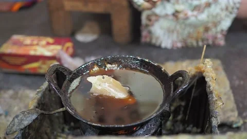 Batik painting process scooping hot wax paraffin or malam using canting Video stock 143754078