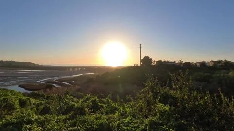 Batiquitos Lagoon Sunset Timelapse Overlook with Coastal Wetlands - 4K 60fps Stock Footage 331620463