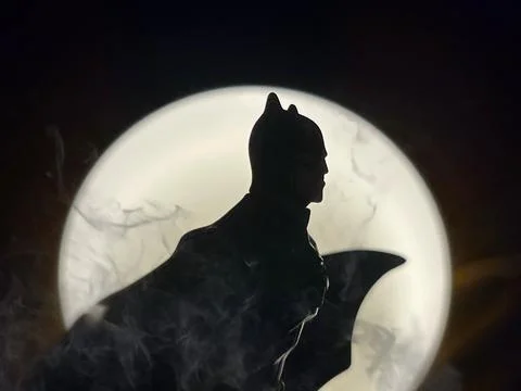 Batman DC Comics toy action figure batsignal silhouette Stock Photos