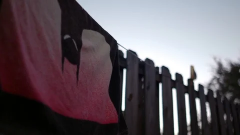 Batman Towel on a Laundry Line Stockbeeldmateriaal 103620672