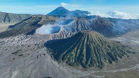 Batok volcano bird eye view reveals dramatic ridges and lush green streaks Stock Photos