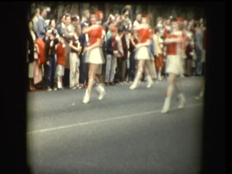 Baton Twirlers in 50's parade Stock Footage