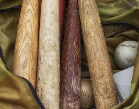 Bats and Softballs Stock Photos