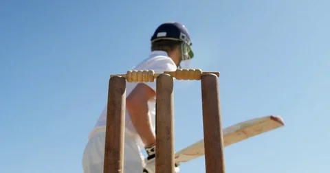 Batsman getting bowled during cricket match Stock Footage