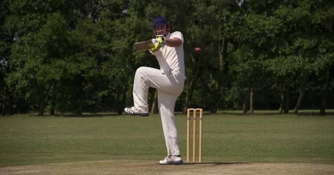 A Batsman playing cricket hits the cricket ball. Vídeo Stock 80426090
