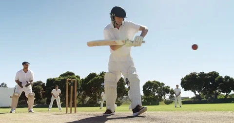 Batsman playing a defensive stroke during cricket match Stock Footage 78640601