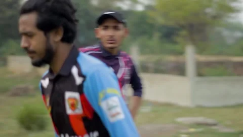 A batsman suddenly left the ground in a local cricket game Stock Footage 293939719