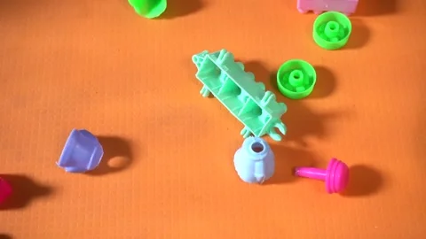 Battat Bag o&amp;#039; Blocks includes a bright green wheeled Stock Footage 335871177
