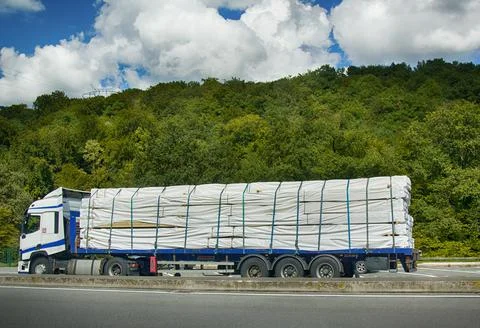 Batten packaged in plastic and loaded in pallet truck Stock Photos