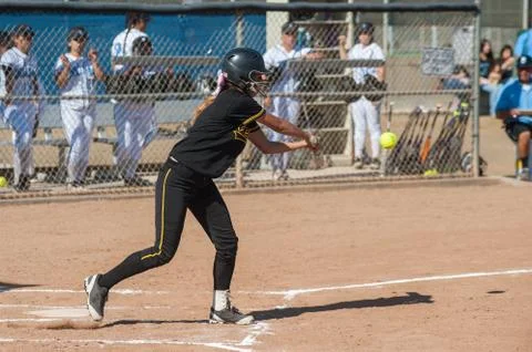 Batter focused on making contact Stock Photos