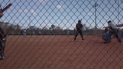Batter hits and grounds out. USA Softball Mens WINTER Classic Stock Footage 263094245