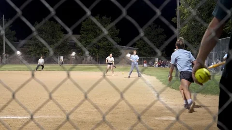 Batter hits line drive down 1st baseline-runs to 2nd Stock Footage 112894107