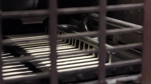 Batter, for wafer cake layers, flows onto a conveyor belt. Video shot close up. Stock Footage 122336170