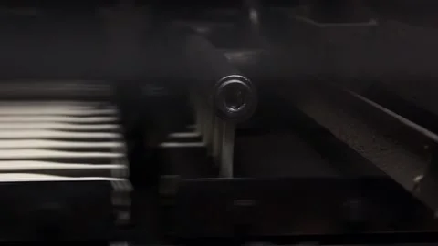 Batter, for wafer cake layers, flows onto a conveyor belt. Video shot close up. Stock Footage 122336196