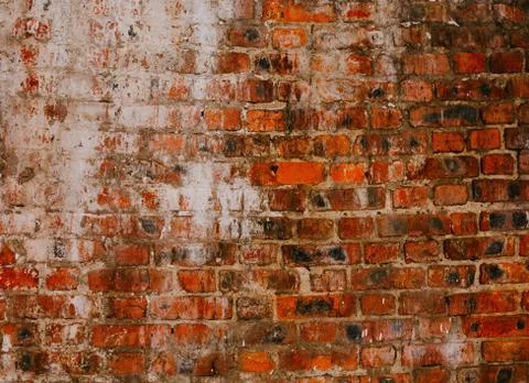 Battered red brick wall Stock Photos