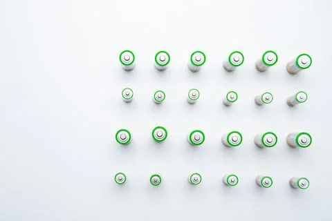 The batteries are arranged in a triangle in the upper corner of the photo on a Stock Photos