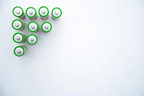The batteries are arranged in a triangle in the upper corner of the photo on a Stock Photos