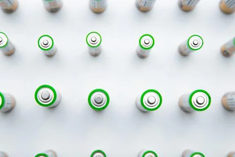 The batteries are arranged in a triangle in the upper corner of the photo on a Stock Photos
