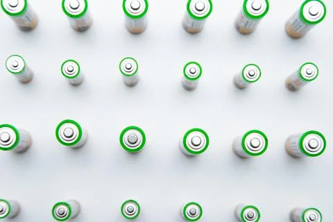 The batteries are arranged in a triangle in the upper corner of the photo on a Stock Photos
