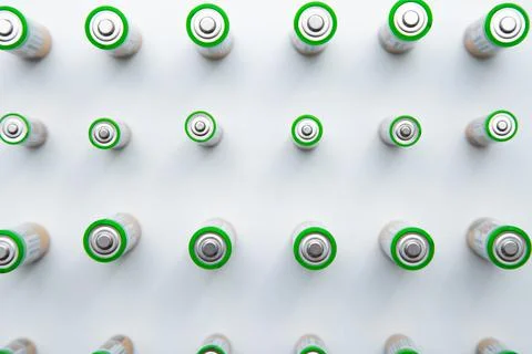 The batteries are arranged in a triangle in the upper corner of the photo on a Stock Photos