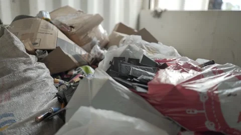 Batteries in a special container for garbage collection Stock Footage 137101964