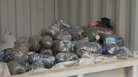 Batteries in a special container for garbage collection Stock Footage 137101972