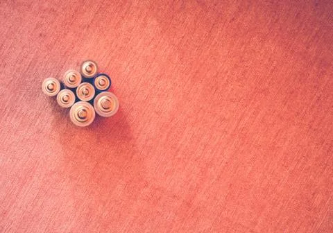 Batteries top view on background Stock Photos