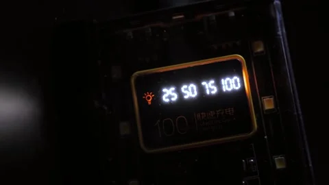 Battery charge indicator. Battery charging icon and digital battery charge Stock Footage 319443372
