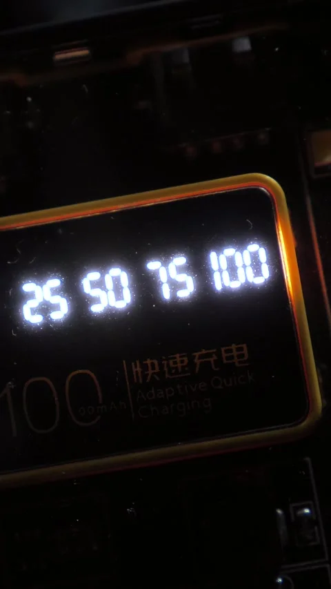 Battery charge indicator. Battery charging icon and digital battery charge Stock Footage 319443701